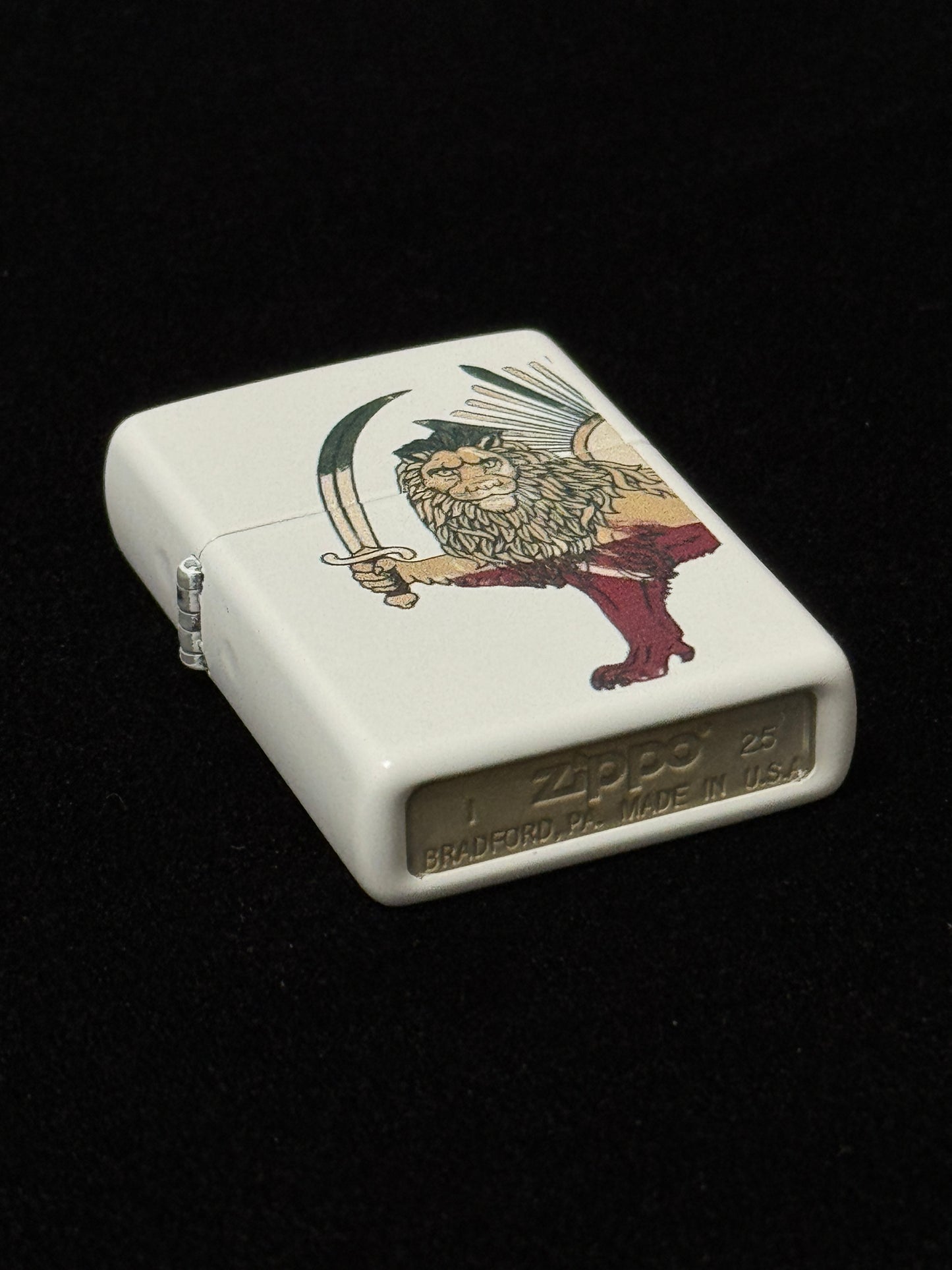 White lighter with Lion and Sun design over the map of Iran 