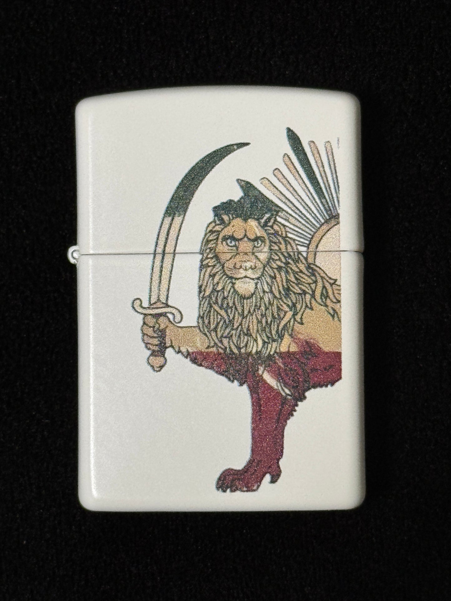 White lighter with Lion and Sun design over the map of Iran on a black background
